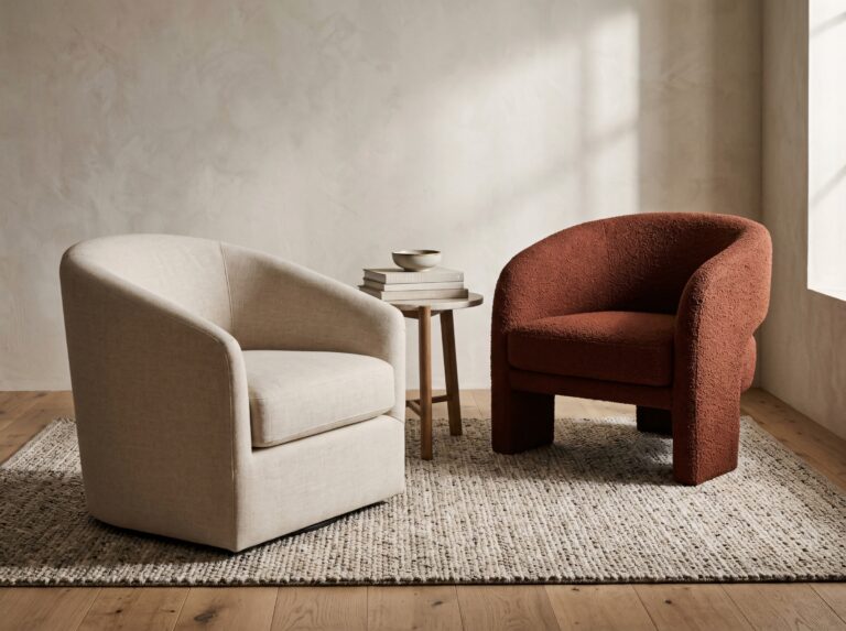 An oatmeal linen tub chair pairs harmoniously with a bolder bouclé accent chair, demonstrating living room accent chair ideas for mixing and matching seating.